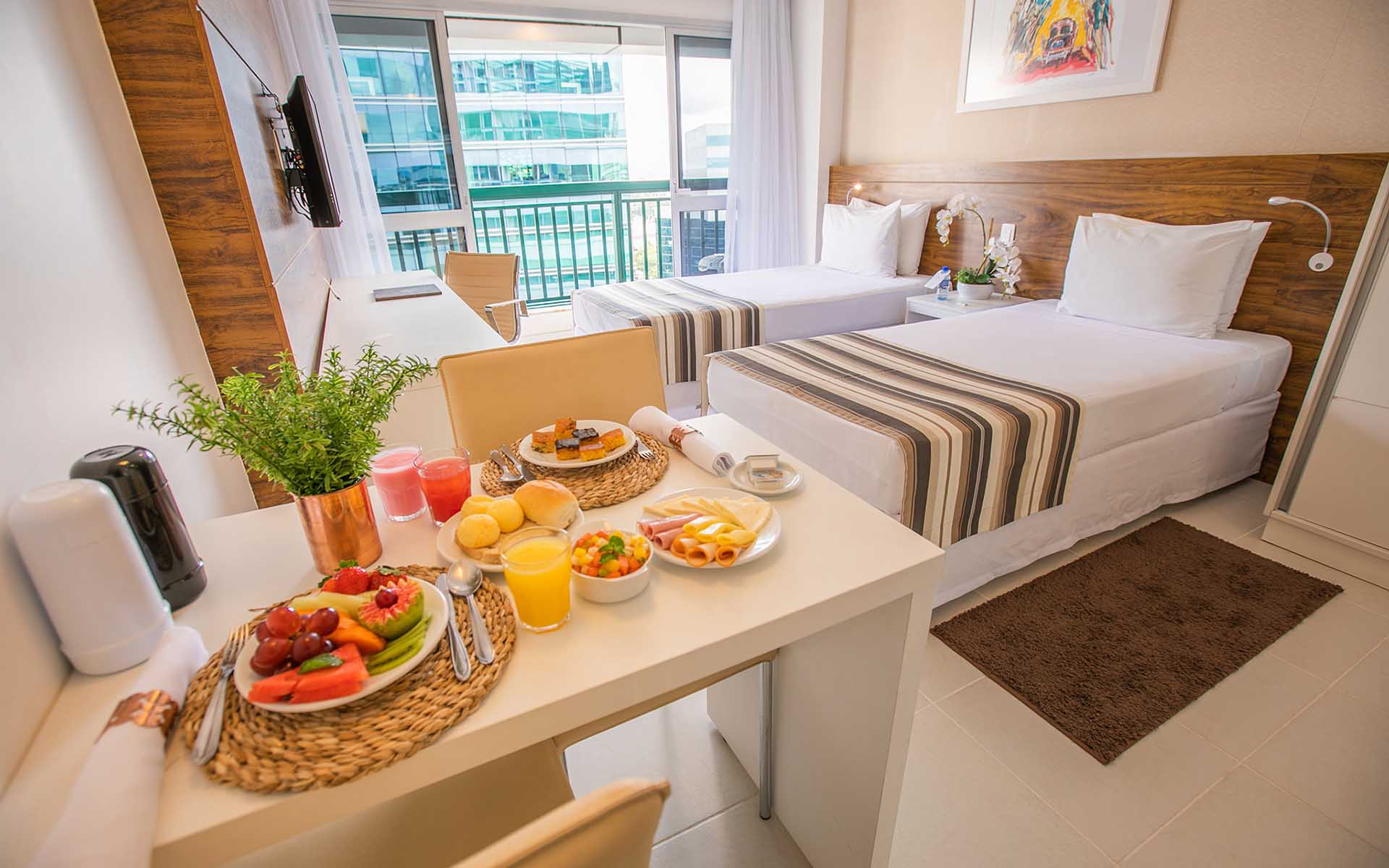 quarto com duas camas de solteiro do vision hplus express hotel em brasilia