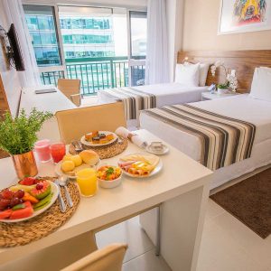 quarto com duas camas de solteiro do vision hplus express hotel em brasilia